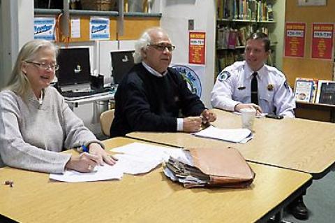 Councilman Dominick Stanzione, center, is the new liaison from the East Hampton Town Board to the Montauk Citizens Advisory Committee. He attended its Monday meeting with Lt. Christopher M. Hatch, the new Montauk precinct commander, right, and the committee’s chairwoman, Lisa Grenci.