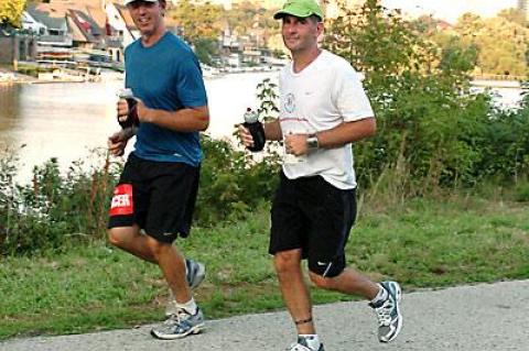 Dennis Fabiszak, at right, and Rich Sandstrom often run together in ultra races.