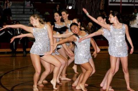 East Hampton High’s dance company assuaged some of the pain of the 60-32 boys basketball loss here Saturday to undefeated Amityville.