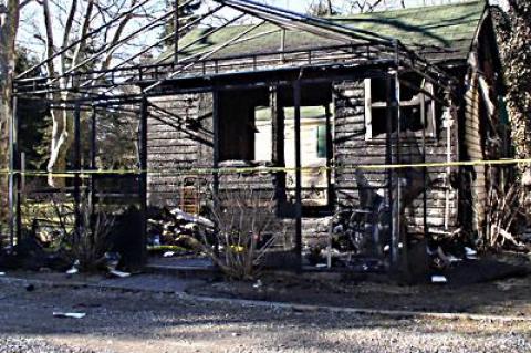 The shell of Cabin 11 at the Cozy Cabins complex in Wainscott in which William Bauer, 78, died in a ball of fire Friday