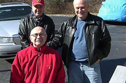 John Behan of Montauk, front, received a visit on Feb. 12 from the man he said saved his life in Vietnam, Tom Morrison, right, and his cousin Gene Jones, left, all of whom served in the Marines.