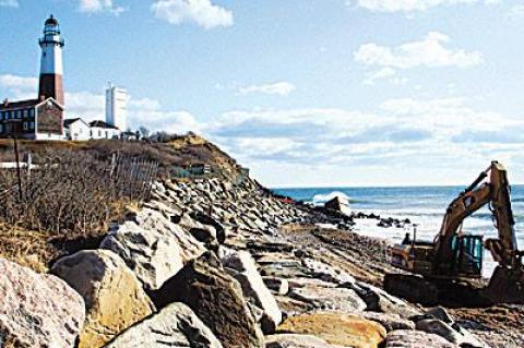 The Montauk Point Lighthouse was placed on the list of National Landmarks this week while the work got under way on the stone revetment that protects the bluff it rests on.