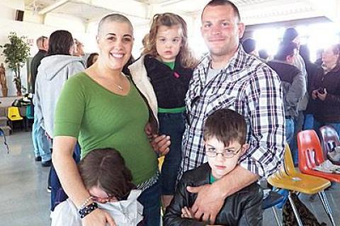 Jean Sracapase was among those who had their heads shaved in a “St. Baldrick’s” fund-raiser for children’s cancer research that netted more than $30,000 at St. Therese of Lisieux Catholic Church on Sunday, to the bemusement of her family.