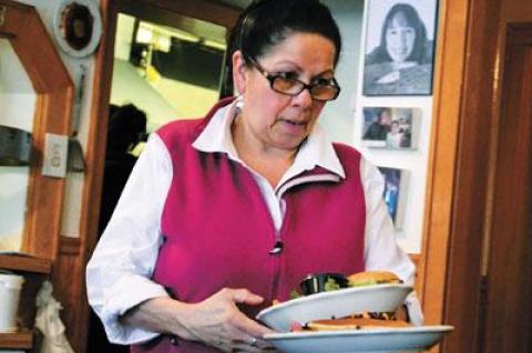 Cristina Albranda has worked at Mr. John’s Pancake House in Montauk for over 30 years.