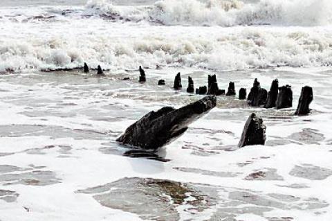 Erosion has laid bare remnants of the brig Mars. The sailing ship went aground on Georgica Beach in 1828.