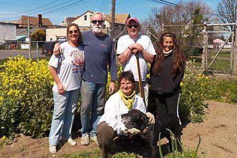 Cheryl Erb, Greg Donohue, Bill Becker, Jennifer Baker, and Susan Vitale started tilling the ground and planting seeds on Saturday at the Montauk Community Garden on the grounds of St. Therese of Lisieux Catholic Church.