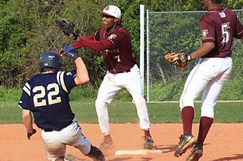 Deilyn Guzman, about to tag out a Bayport-Blue Point runner in the early going of Monday’s 6-0 loss here, was the winning pitcher in the third game of the Shoreham series.