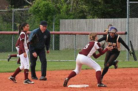 While East Hampton’s shortstop, Ali Harned, made the putout above, late-inning errors did the Bonackers in in the game here with Islip on May 2.