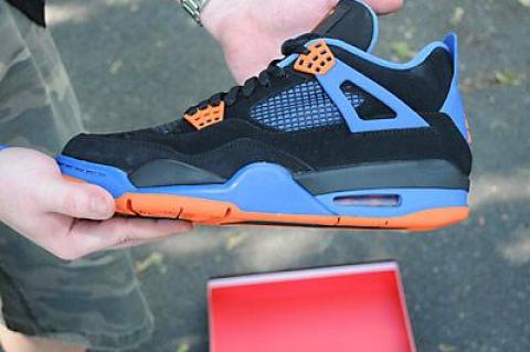 Eighteen pairs of a coveted Retro Jordan 4 had people lining up all night in advance of Sneakerology’s Saturday store hours.