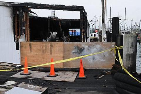 A fire destroyed the packing house at the Montauk Fish Dock early Friday morning. It will be rebuilt.