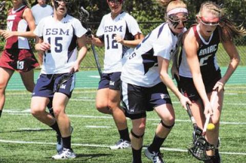 Carley Seekamp, at right, and her East Hampton teammates were closely marked by their Eastport-South Manor peers. Nothing came easy.