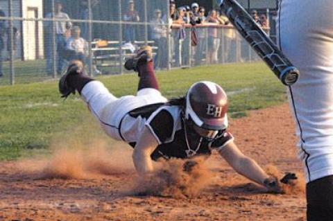 Deryn Hahn, airborne above, scored East Hampton’s second run, having been doubled home by Kathryn Hess in the sixth inning.