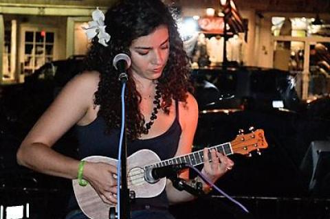 Lilly-Anne Merat has been a featured performer at the Thursday night open mike at Phao in Sag Harbor. Her father, Alfredo Merat, is a musician and the manager of the restaurant.