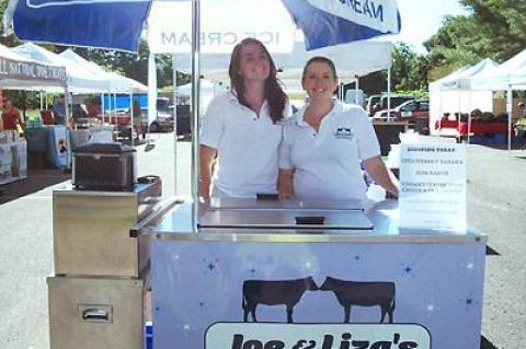 Liza Tremblay, right, co-owner of Joe and Liza’s Ice Cream of Sag Harbor, made in Sag Harbor, with her assistant Claire Timmons, left, at the East Hampton Farmers Market