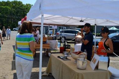 Local farmers and food purveyors began setting up outdoor stands in the parking lot at Whole Foods in Wainscott last week, shielded from the sun by makeshift tents.