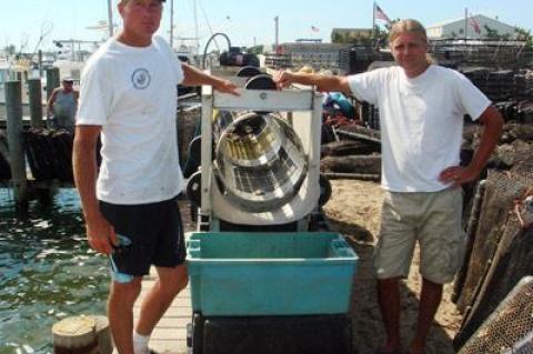 Mike Martinsen, left, and Mike Doall, are the “two Mikes” behind the Montauk Shellfish Company’s oyster farm in Lake Montauk.