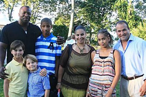 The Ryans and Plotkins got together at Luly Duke’s house for Saturday’s fireworks. David Plotkin, right, chairman of the Max Cure Foundation, is shown with his sons, Max, 9, and Alex, 7, at left, along with Amos and Canela Ryan and their children, Jalen, 11, and Manijeh, 14.