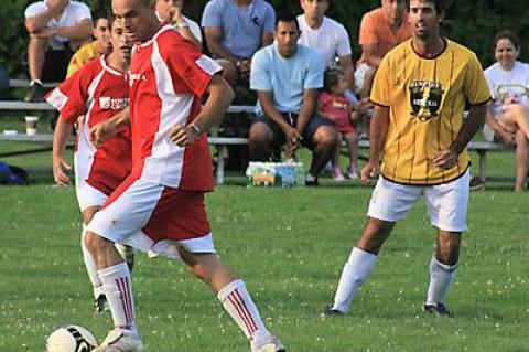 Rene Gutierrez, with the ball above, preserved Tortorella’s 2-1 upset of 75 Main near the end of the first of July 25’s semifinal matchups.