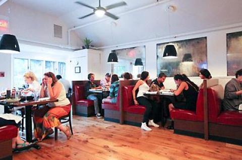 Some of the American Bistro interior renovations remain: large comfortable red Naugahyde booths, hanging light fixtures with big black shades, and nice wood plank floors.