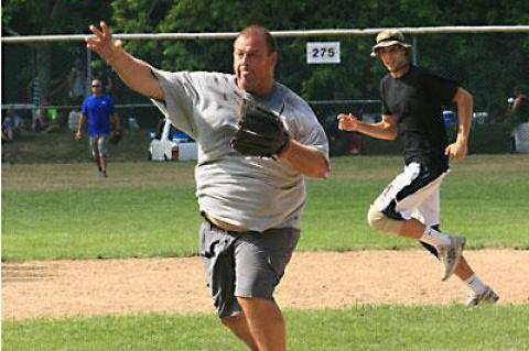 Geoff Miller, though he’s added some pounds since he played the hot corner for Fred’s Big Guns, four-time men’s slow-pitch champions in the 1990s, pitched and fielded well for the Springs Fire Department’s entry.