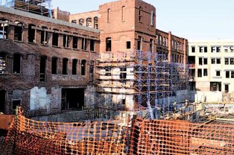 A collapse of a 10-foot wall within the former Bulova watch factory resulted in a temporary setback of the section’s restoration while its safety is assessed.