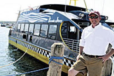 Jim Ryan, whose idea it was to offer passenger ferry service between Greenport and Sag Harbor, was its captain on Saturday, making several trips in and out of Mitchell Park Marina.