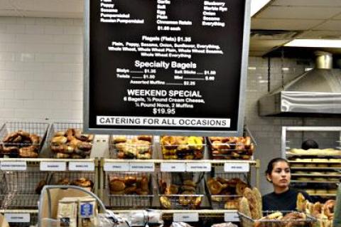 Aura Hernandez doled out bagels to hungry customers at the Goldberg’s Famous Bagels in East Hampton.