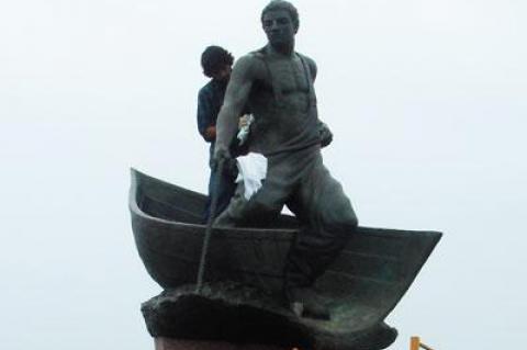 Malcolm Frazier, a sculptor, completed this bronze boat and fisherman 13 years ago to memorialize local fishermen lost at sea. Its pedestal is engraved with over 100 names. The sculpture, erected seaward of the Montauk Point Lighthouse in October of 1999, got a thorough cleaning last week.