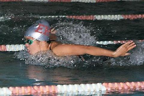 Morgan German, competing in the 100-yard butterfly above, was East Hampton’s “most outstanding swimmer” in the meet here with Huntington on Oct. 9.