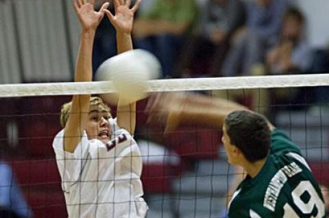 Robert Anderson seemed to have the net well taken care of as Westhampton Beach’s Collin Carrieri attempted a kill.