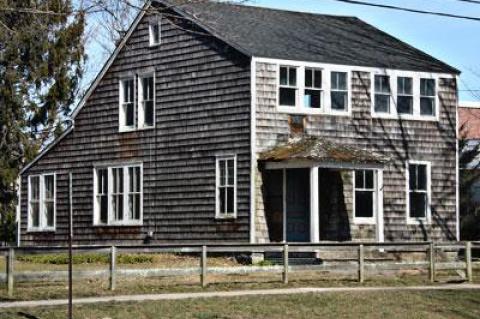 The Osborn House on Newtown Lane in East Hampton has been enjoying a very public face-lift over the past eight months. Its “before” state in March of this year.