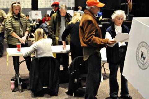 Voters cast ballots Tuesday afternoon in the East Hampton High School auditorium, where polls were understaffed, according to one worker, but still orderly.