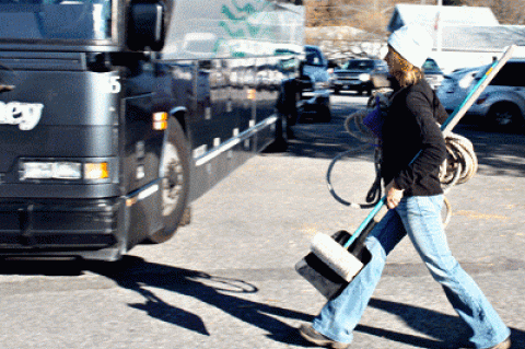 A volunteer helped load a Hampton Jitney with supplies for a trip to Breezy Point Tuesday to help in cleanup efforts.