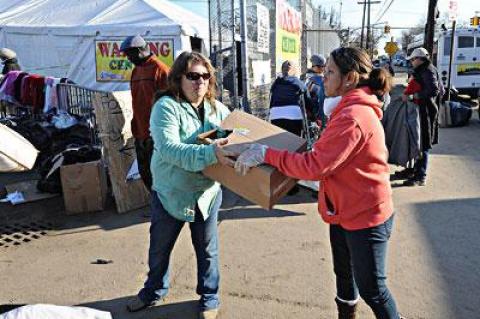 Dorine Drohan, left, and Marilyn Torres of East End Cares unloaded donated goods at St. Francis de Sales Catholic Church in Belle Harbor in the Rockaways on Sunday.