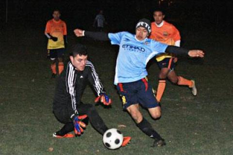 Bateman Painting’s Jonathan Lizano almost made it 3-2 in Monday’s second half, but Maidstone Market’s goalie, Alex Meza, made the stop.