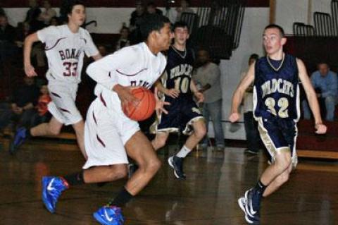 Rolando Garces, in action against Shoreham-Wading River above, went on to score a career-high 33 points at Elwood-John Glenn two days later.