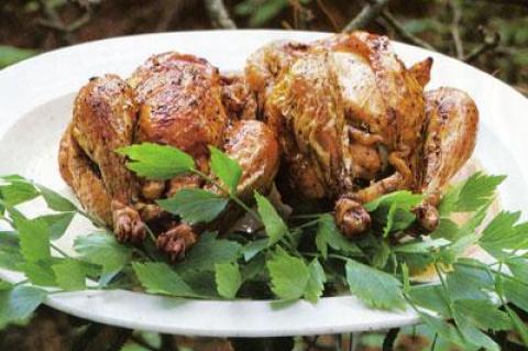 Lee Bailey’s lovage and apple stuffed roasted chicken, from his book “Country Weekends,” is one of the writer’s favorite chicken recipes.