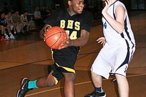 Josh Lamison was a force in the paint for the Killer Bees this season despite the fact that he’s only a freshman. He’s shown in action above at the Ross School.