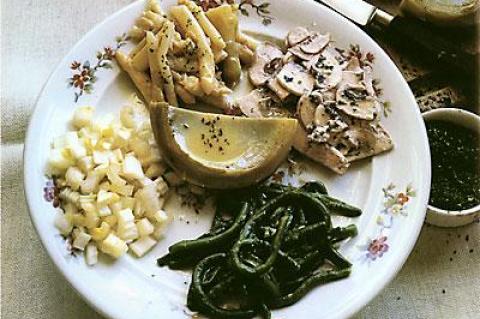 Salade Tourangelle, from Robert Freson’s “The Taste of France,” is a selection of cooked artichoke hearts, asparagus, and green beans served with raw celery and mushrooms, each with its own separate vinaigrette.