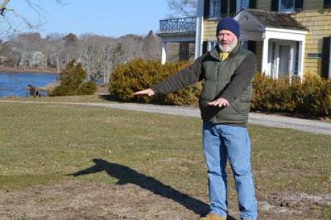 A brass-gilt button with a Dutch tulip from a 17th-century men’s coat was just one of the thousands of artifacts found at Shelter Island’s Sylvester Manor farm by Stephen Mrozowski. He returned to the farm last week to determine the location of hundreds of workers who may be buried there.