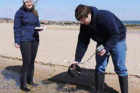 East Hampton Town Trustee Stephanie Forsberg and Christopher Gobler of Stony Brook University collected water samples at a number of sites in East Hampton Town yesterday as part of a trustee-sponsored effort to monitor the presence of algal blooms.