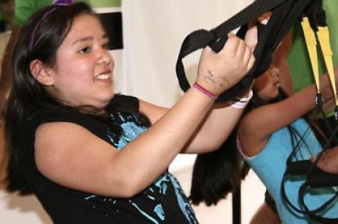 Alandra Aguilar was one of six Springs School I-Tri sixth graders who were given a free workout with TRX straps last Thursday afternoon at the Epic Strength and Conditioning studio adjacent to the Maidstone Market.