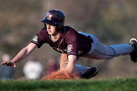 Max Lerner, who was to score East Hampton’s sole run in the high school baseball game with Bayport-Blue Point here Friday, slid safely back into first base in the sixth inning.