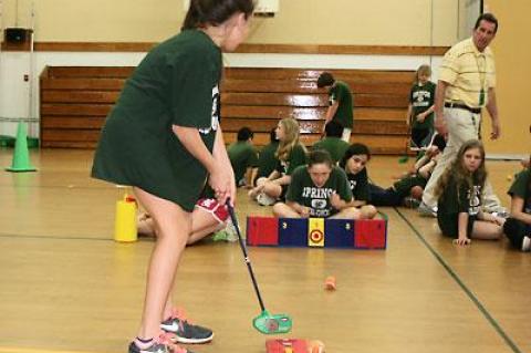 The gym at the Springs School was full of sixth graders learning the game of golf Tuesday morning under the watchful eyes of Mark McKee, above, and John Foster thanks to Kevin Smith, the head pro at Montauk Downs, and the Greater East Hampton Education Foundation.