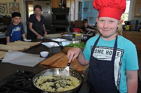 Stephen Cummings helped prepare lunch for his fellow students at the Hayground School in Bridgehampton on Tuesday.