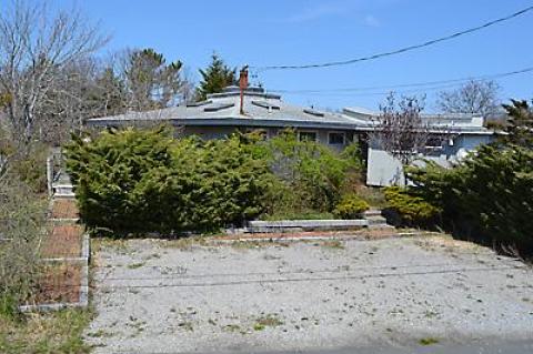 Steven Dubb bought a house at 142 Central Avenue in Beach Hampton in August. It was described by several speakers at the meeting as a dilapidated eyesore