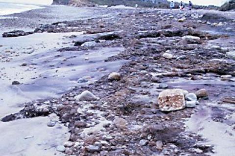 Not only could swimmers encounter underwater obstructions — or body surfers find themselves whooshed ashore onto a bed of rocks — but people strolling along the beach, in its present state, will have to clamber over half-buried boulders.