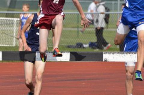 Erik Engstrom was to slip in passing over the water jump, but still finished third in the 2,000-meter steeplechase.