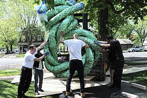 Art movers moved one of John Chamberlain’s late aluminum sculptures in place at Guild Hall on Monday. The piece, lent by Gagosian Gallery, is titled Mermaidmischief and was completed in 2009.