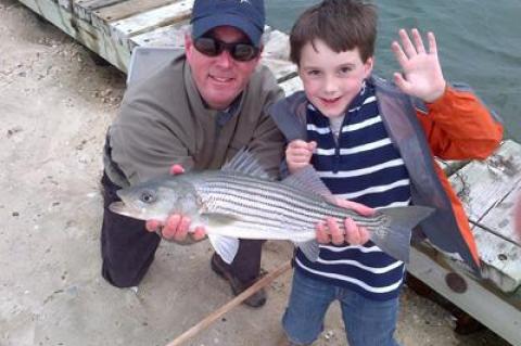 Edward Shugrue and his nephew Max Herman found their first striped bass of the season in Three Mile Harbor over the weekend.